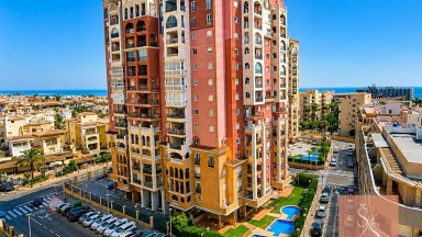 Prostorný apartmán s bazénem a garáží jen 100 metrů od pláže Playa de los Locos
