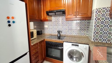 Prostorný apartmán s bazénem a garáží jen 100 metrů od pláže Playa de los Locos