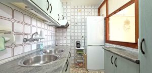 Apartmán Punta Prima, kuchyň